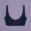 Prince x Mott navy sports bra with scoop-back and a small red logo centred on the back. 