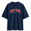 Navy Tee with red 'New York' arched logo on the front centre. Prince x Mott logo underneath the arch New York Logo. 
White background, ghost mannequin image. 