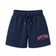 Navy blue sweat shorts with an elastic drawstring waist, side pockets, and 'NEW YORK' printed in red on the left leg, shown on a plain white background.